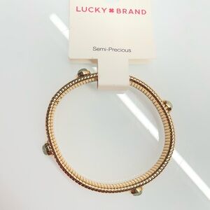 Lucky Brand gold-tone semi-precious cuff bracelet with a snake-chain design